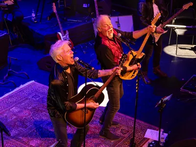 Bild av Clapton vs Springsteen